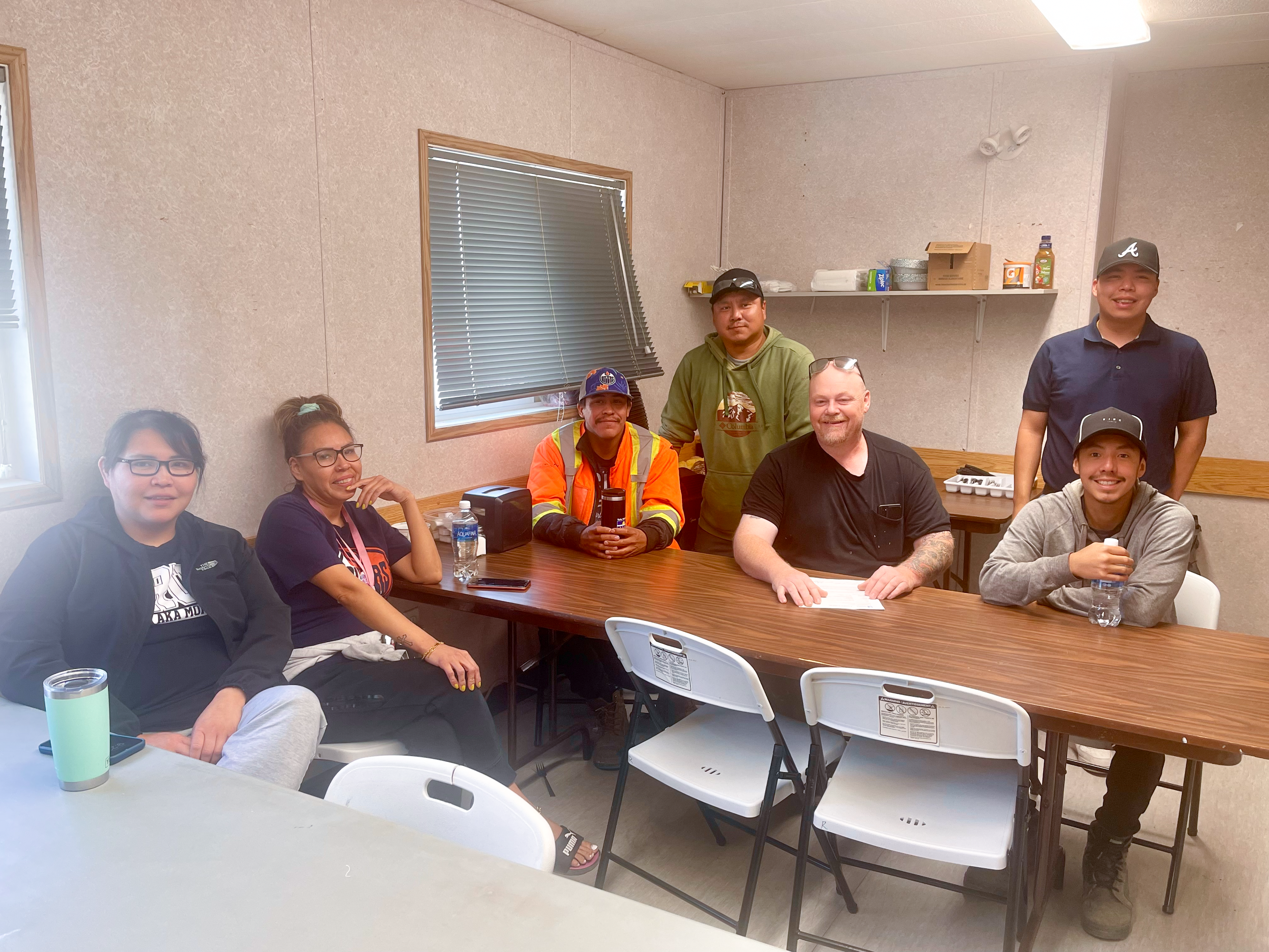 Pictured left to right: Deloris Nitsiza, Samantha Nitsiza, Marvin Migwi, Robert Judas, Kevin Forrest (Aurora College Instructor), Chaz Etsemba and Paul Chocolate. 