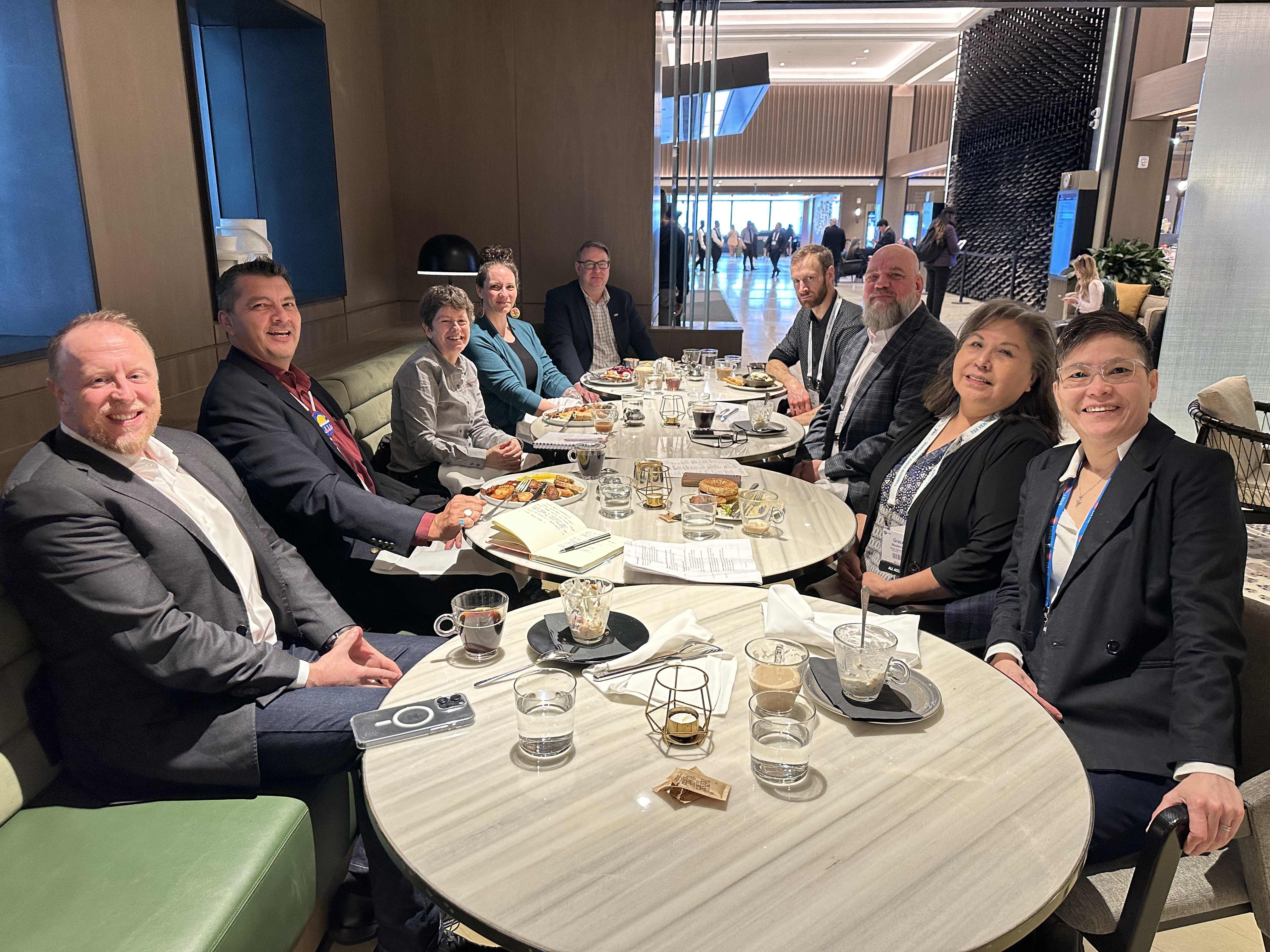 Photo of TIC staff meeting Burgundy staff